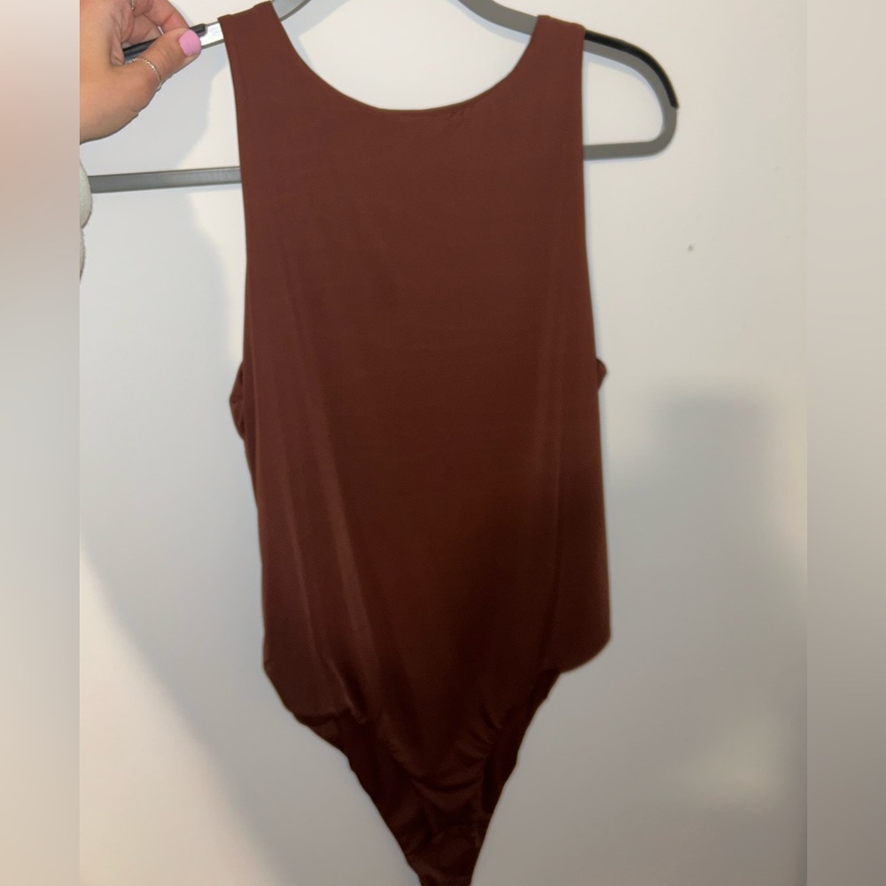 Brand new never worn brown body suit!